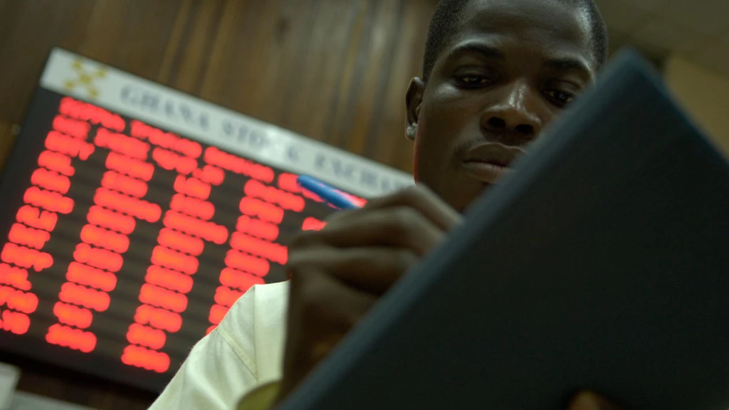 A man taking notes at the Ghana Stock Exchange in Accra, Ghana